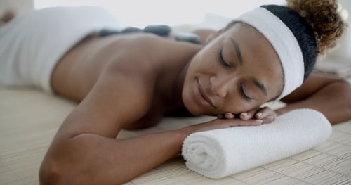 Young Female Relaxing In Spa Salon