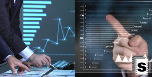 Businessmen Reviewing Charts and Graphs in Futuristic Office