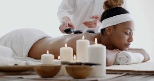Woman Getting Hot Stone Massage