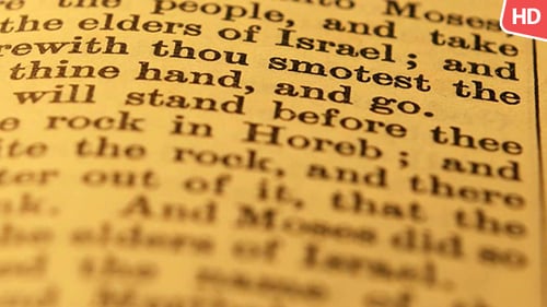 Close-Up on Aged Bible Text Passage