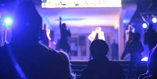 Exciting Concert with Band Performing on Stage