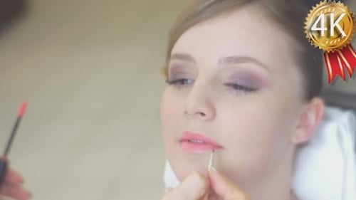 Stylist Puts the Lipstick On