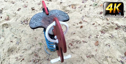 Wooden Cockhorse in Playground Park and Soil