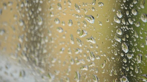 Rain Water on Glass During a Rainstorm