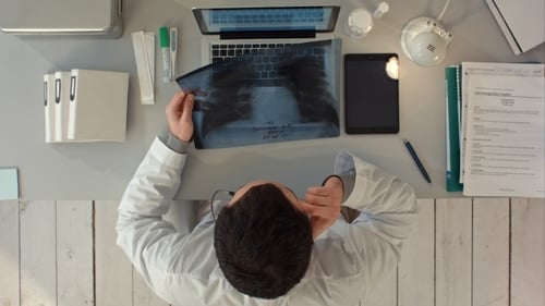 Radiologist Man Checking Xray