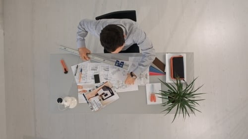 Architect Is Working On Plan Of Building