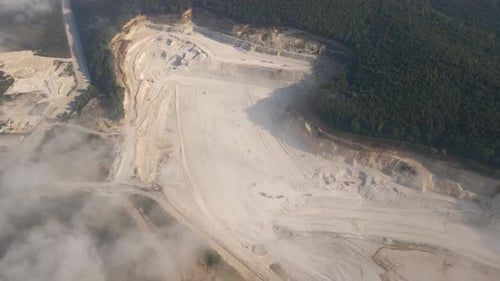 Aerial View of Open Pit Mining Site of Limestone Materials Extraction for Construction Industry with