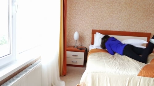 Woman Falls On The Bed
