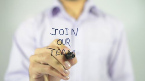 Writing Join Our Team on Glass