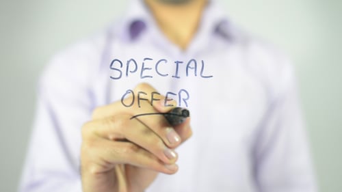 Man Writes 'Special Offer' Toward Camera