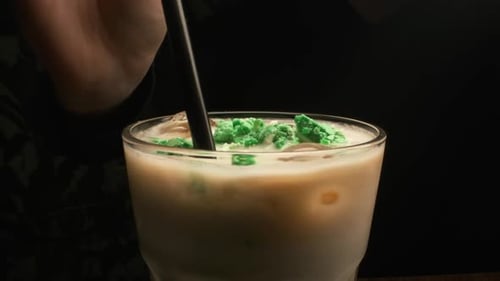 Delicious Drink With Dairy And Mint Ingredients. Mixing. Close-up.