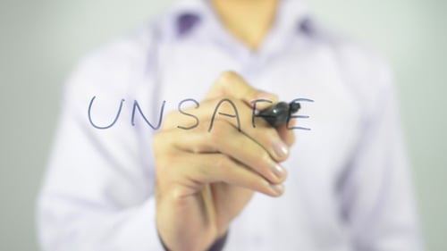 Writing 'Unsafe' on Transparent Surface with Marker