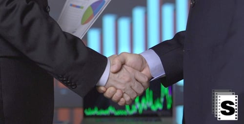 Businessmen Shaking Hands on Financial Agreement