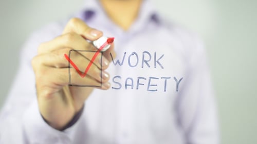 Work Safety Checkmark on Clear Surface