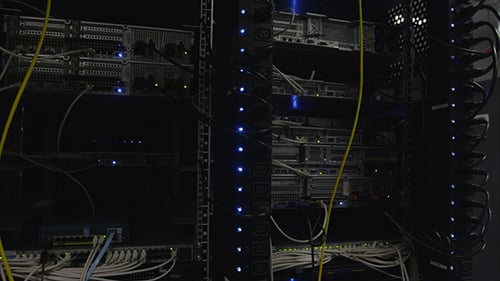 Data Center Servers with Flashing Lights and Cables