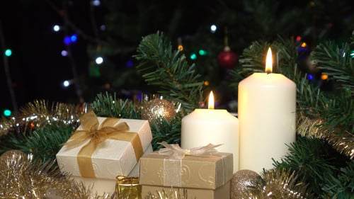 Christmas Gift And Light Candle