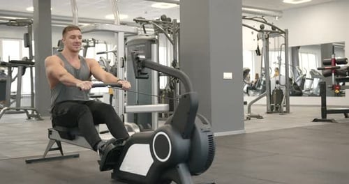 Sporty Candid Man Training at Workout Studio