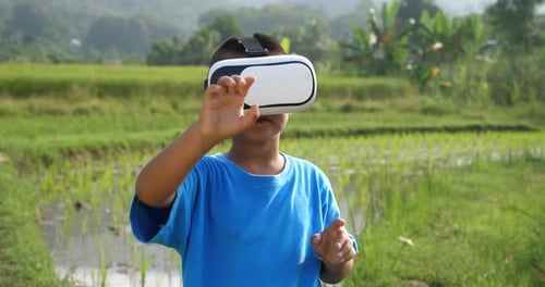 Rural Boy Wears a VR Headset