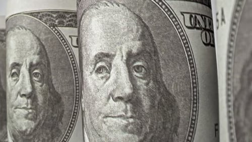 American one hundred dollar paper banknote in close up macro view dolly shot.