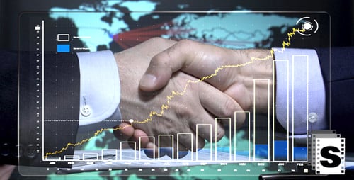 Businessmen Shake Hands Over Financial Chart