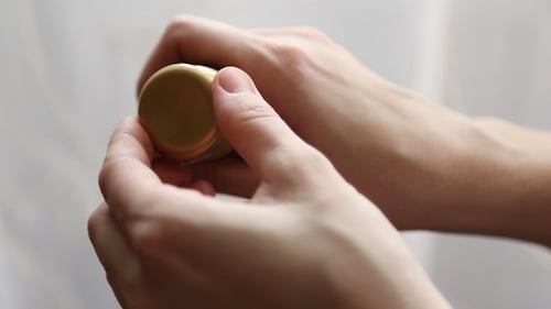 Woman Uses Hand Cream