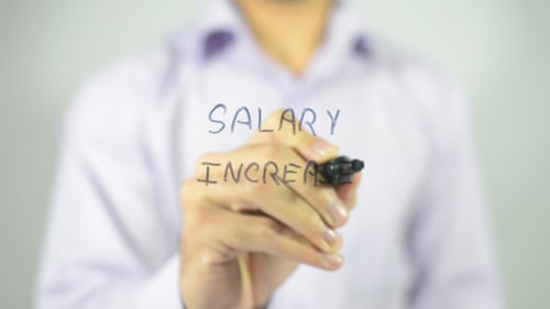 Writing Salary Increase on Clear Surface