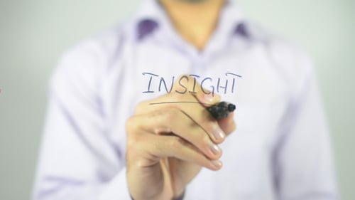 Writing Insight On Clear Surface with Black Marker