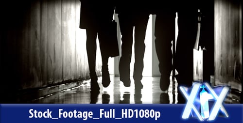Silhouetted Group Walking Confidently in Dark Hallway