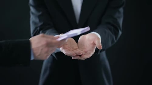 Euro Bills Exchanged in a Deal