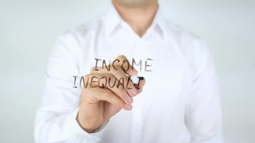 Man Writes "Income Inequality" on Glass Surface
