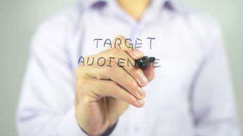 Hand Writing Target Audience Concept on Transparent Surface