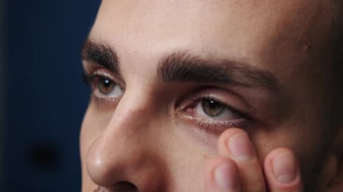 Close Up Portrait Man with a Problem Crying. Cry People Concept. Tears in Eyes of Crying Man. True