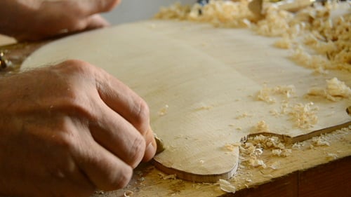 Luthier Working in a Electric Guitar