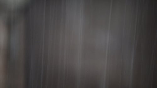 Abstract Grey Background with Blurry Vertical Motion