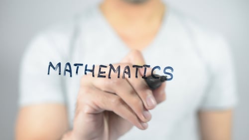 Mathematics Written Out by Hand with Blue Marker