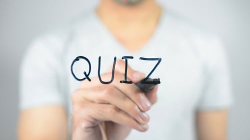Hand Writing Quiz on Clear Surface