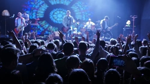 Rock Band Performs Live Concert for Cheering Crowd