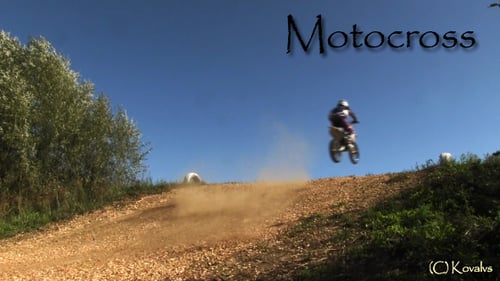 Dirt Bike Rider Racing on Rural Motocross Track