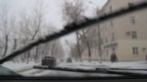 Automotive Wiper Clean Off the Snow from the Windshield