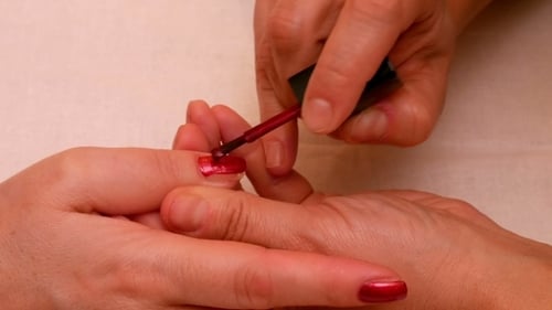 Manicure Painting And Polishing Nails In Spa Salon