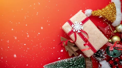 Christmas Gift with Ornaments and Snowflakes Falling