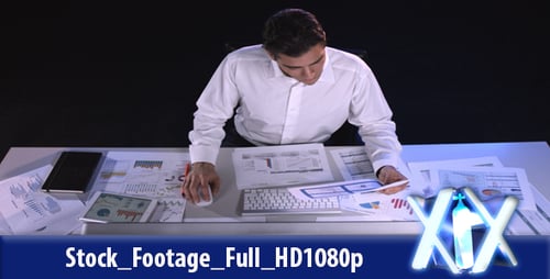 Office Worker Analyzing Reports