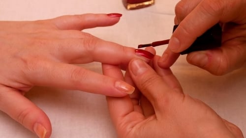 Manicure Painting And Polishing Nails In Spa Salon