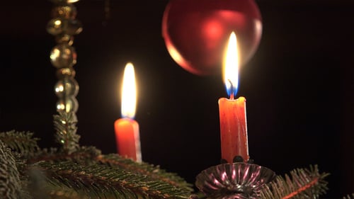 Christmas Candles on Snowy Pine Branch Decoration