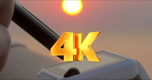 Stylus Tapping Smart Watch at Sunrise