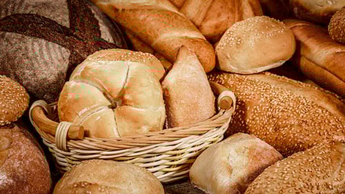 Variety of Delicious Baked Bread in a Basket
