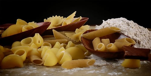 Variety of Uncooked Pasta with Flour