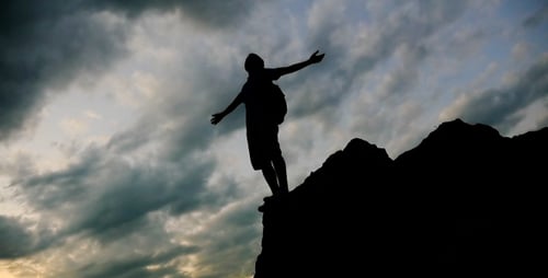 Silhouette On The Cliff