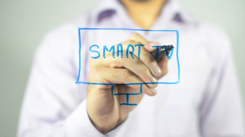 Drawing Smart TV with Blue Marker