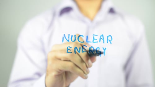 Hand Writing Nuclear Energy Concept